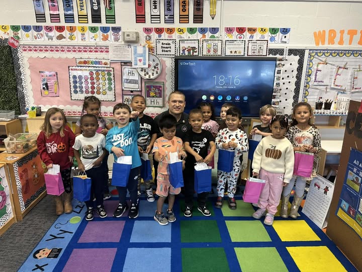 Commander Timothy Pittman of the Roanoke Valley Rescue Squad spent time at Clara Hearne Pre-K reading books to the children